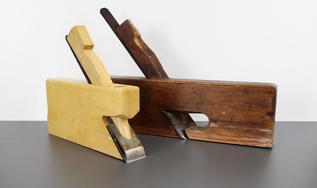 woodworking bench with clamps measuring tools and timber for furniture assembly